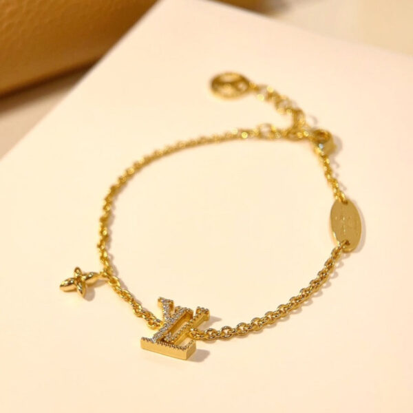 Toxse  Logo Star Motif Gold Bracelet - Image 2