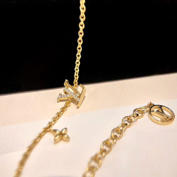 Toxse  Logo Star Motif Gold Bracelet - Image 9
