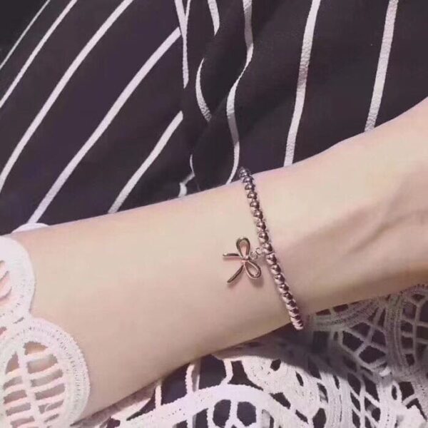 Toxse Bow Charm Bead Bracelet - Image 4