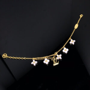 Toxse  Logo 6 Motif Star And Sun Gold Bracelet