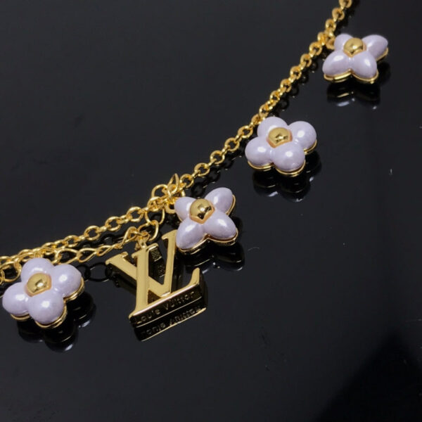 Toxse  Logo 6 Motif Star And Sun Gold Bracelet - Image 2
