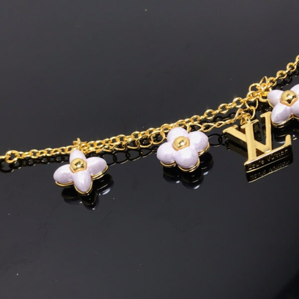 Toxse  Logo 6 Motif Star And Sun Gold Bracelet - Image 3