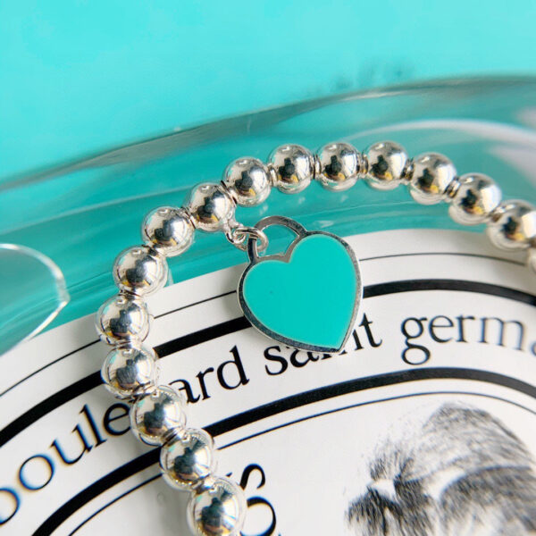 Toxse T - Jewelry Return Bracelet With Blue Charm - Image 4