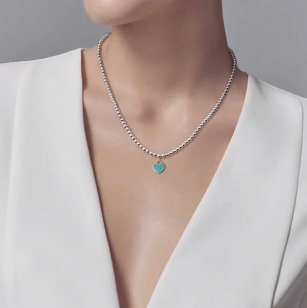 Toxse T - Jewelry Return Necklace With Blue Charm - Image 2