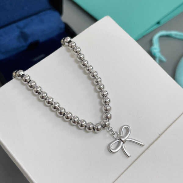 Toxse T - Jewelry Return Bracelet With Bow Tie Charm - Image 4
