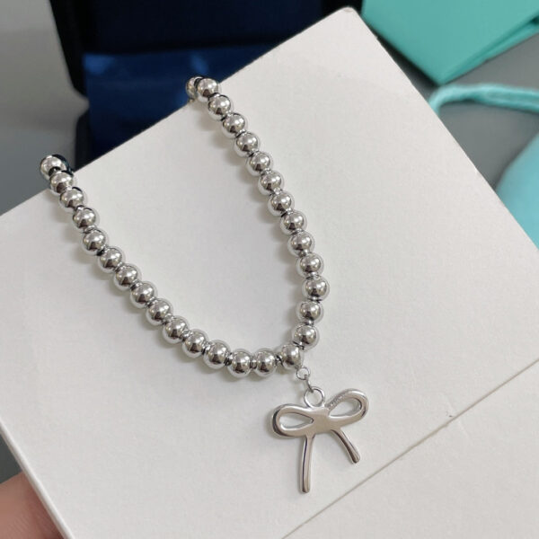 Toxse T - Jewelry Return Bracelet With Bow Tie Charm - Image 5