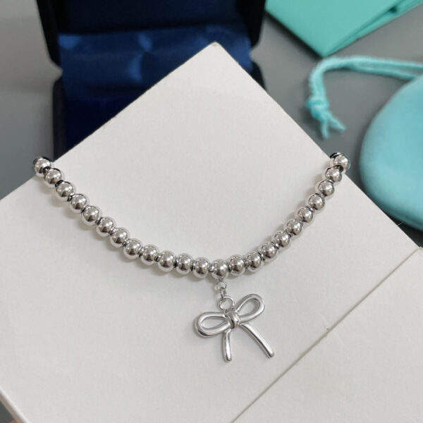 Toxse T - Jewelry Return Bracelet With Bow Tie Charm - Image 6