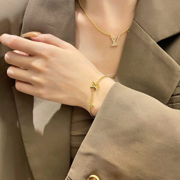 Toxse  Logo Star Motif Gold Bracelet - Image 3