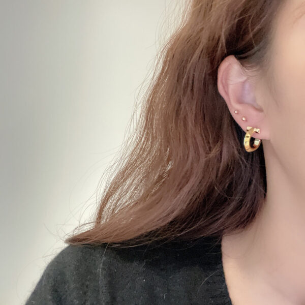 Toxse Plain T Hoop Earrings - Image 2